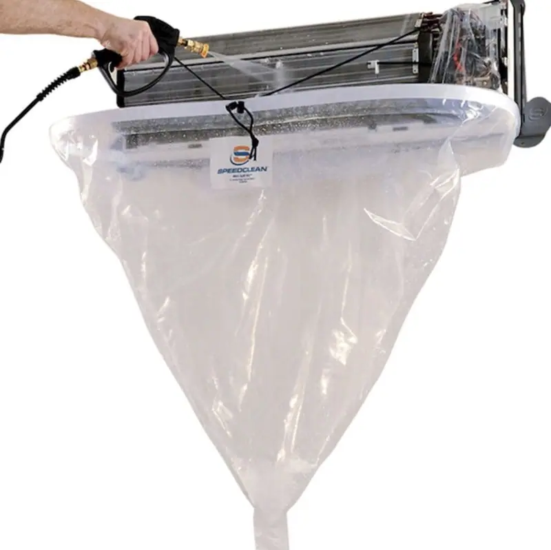 SpeedClean mini-split bib in place under a Brooklyn ductless head during a full coil clean