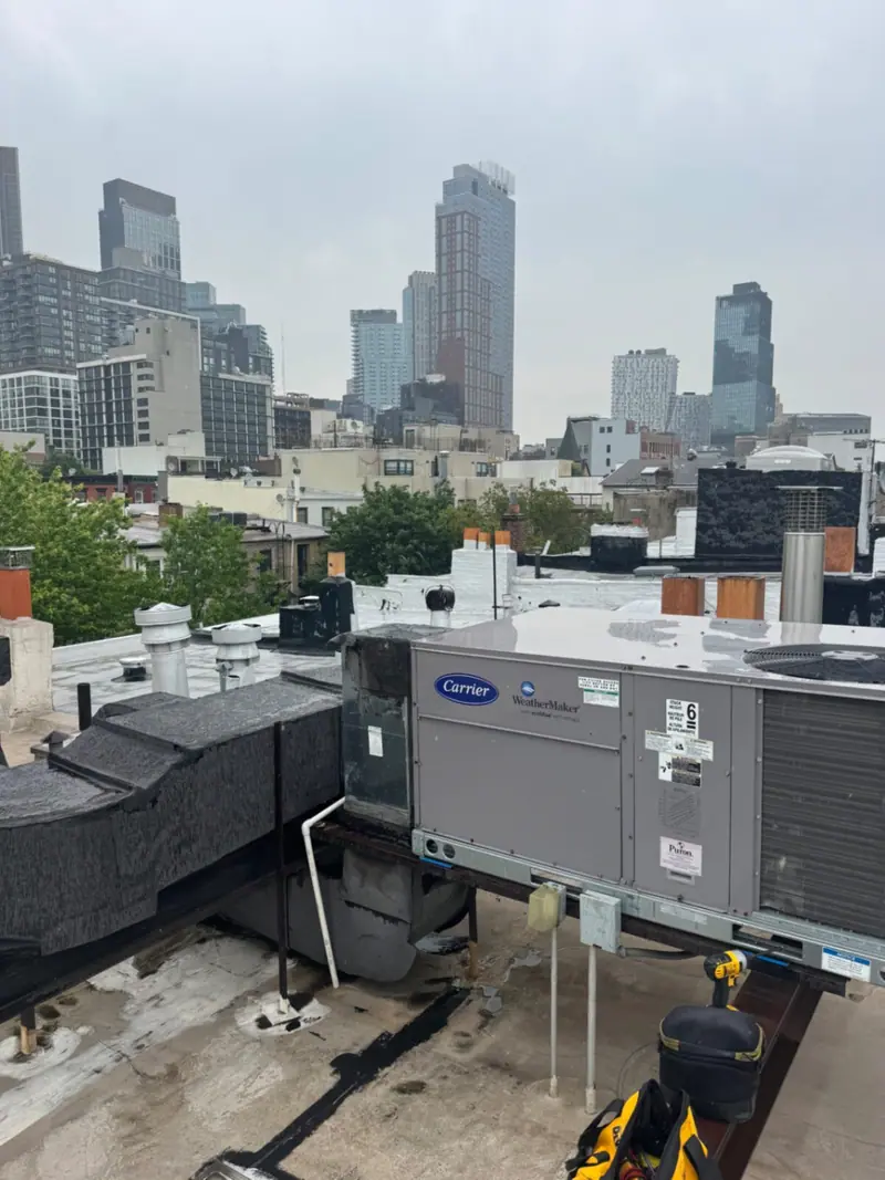 Brooklyn commercial HVAC install — Carrier WeatherMaker rooftop unit in downtown Brooklyn